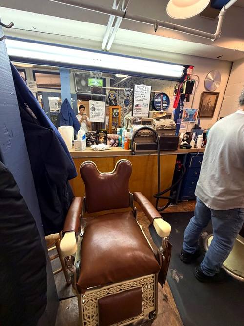 The vintage barber chair at Balcony Barber Shop