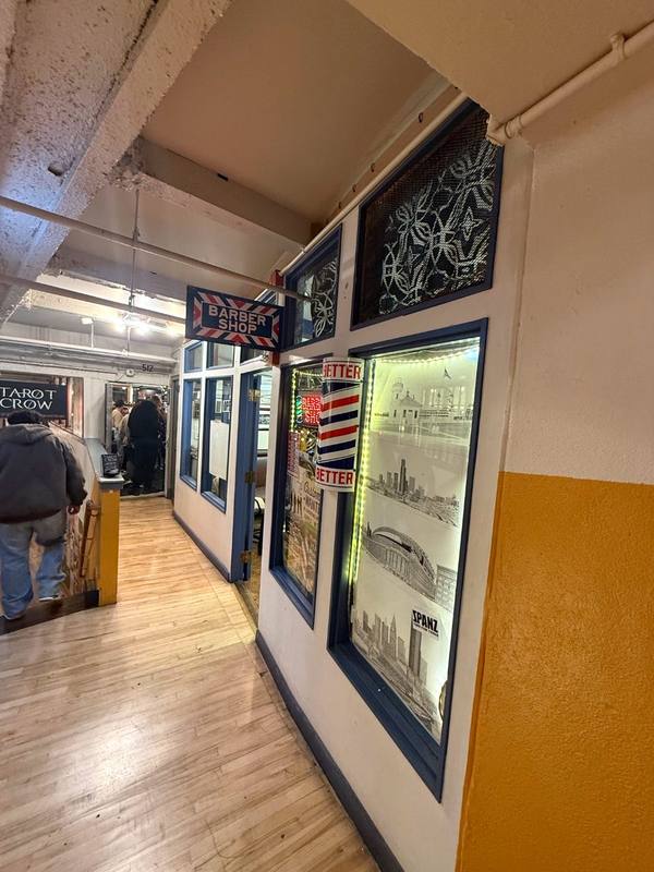 The hallway leading to Balcony Barber Shop at Pike Place Market