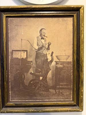 Vintage portrait photograph on the barbershop wall